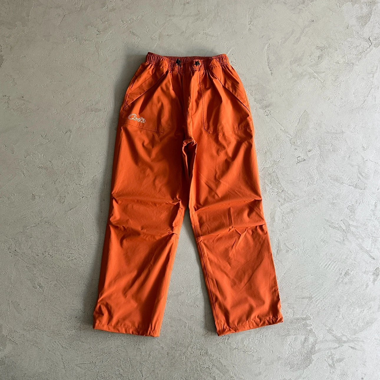 Corteiz Orange Tracksuit Pants